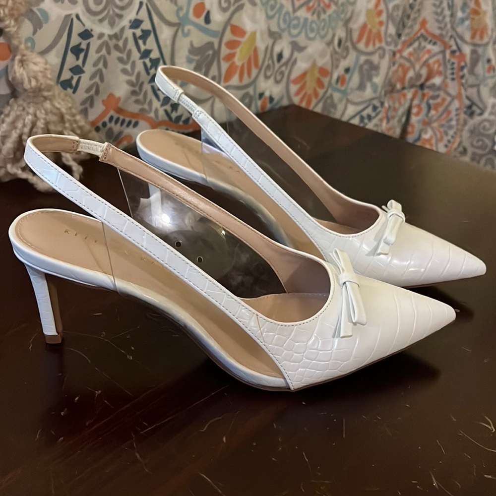 Sassy white heels
